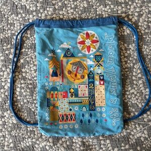 Disney Parks It’s a Small World string backpack